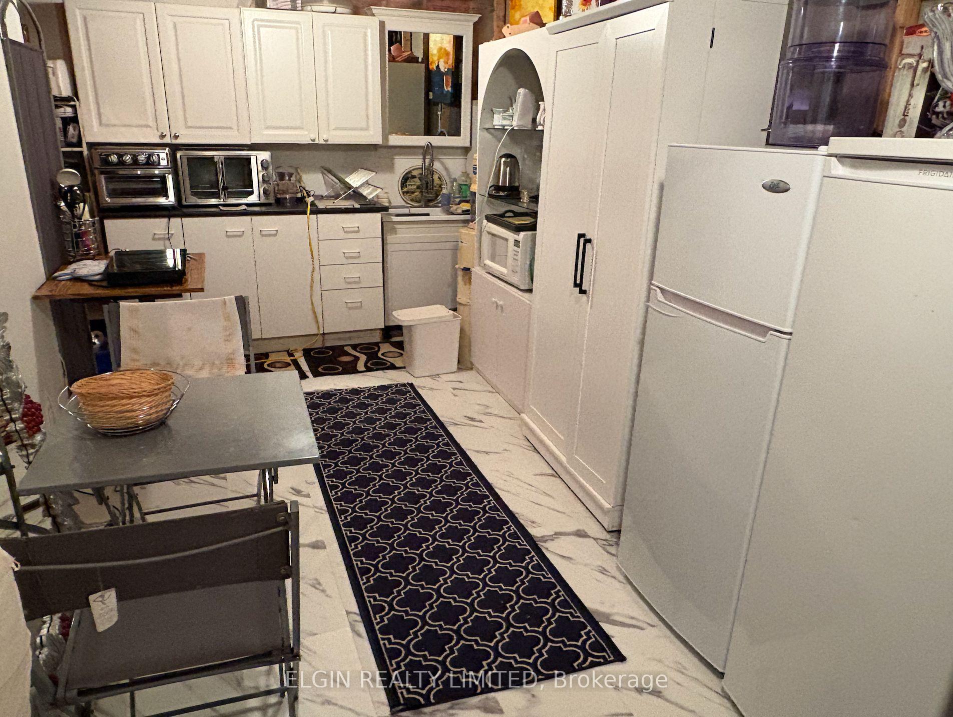 Photo 8 of Unit 5, 20 Windemere Place, St. Thomas — HOMEH