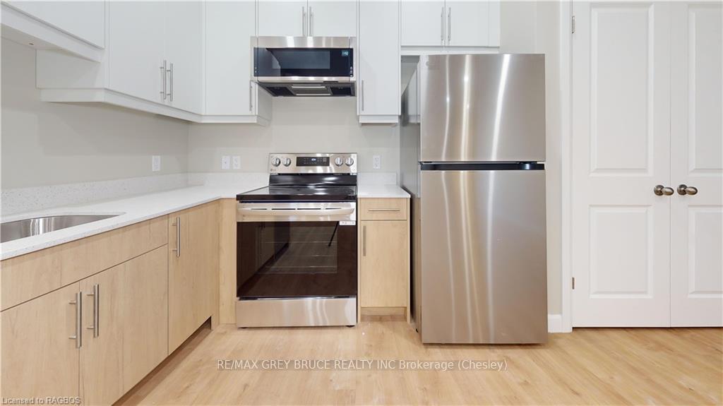 Photo 2 of Unit 2, 44 1ST Avenue S, Arran-Elderslie — HOMEH