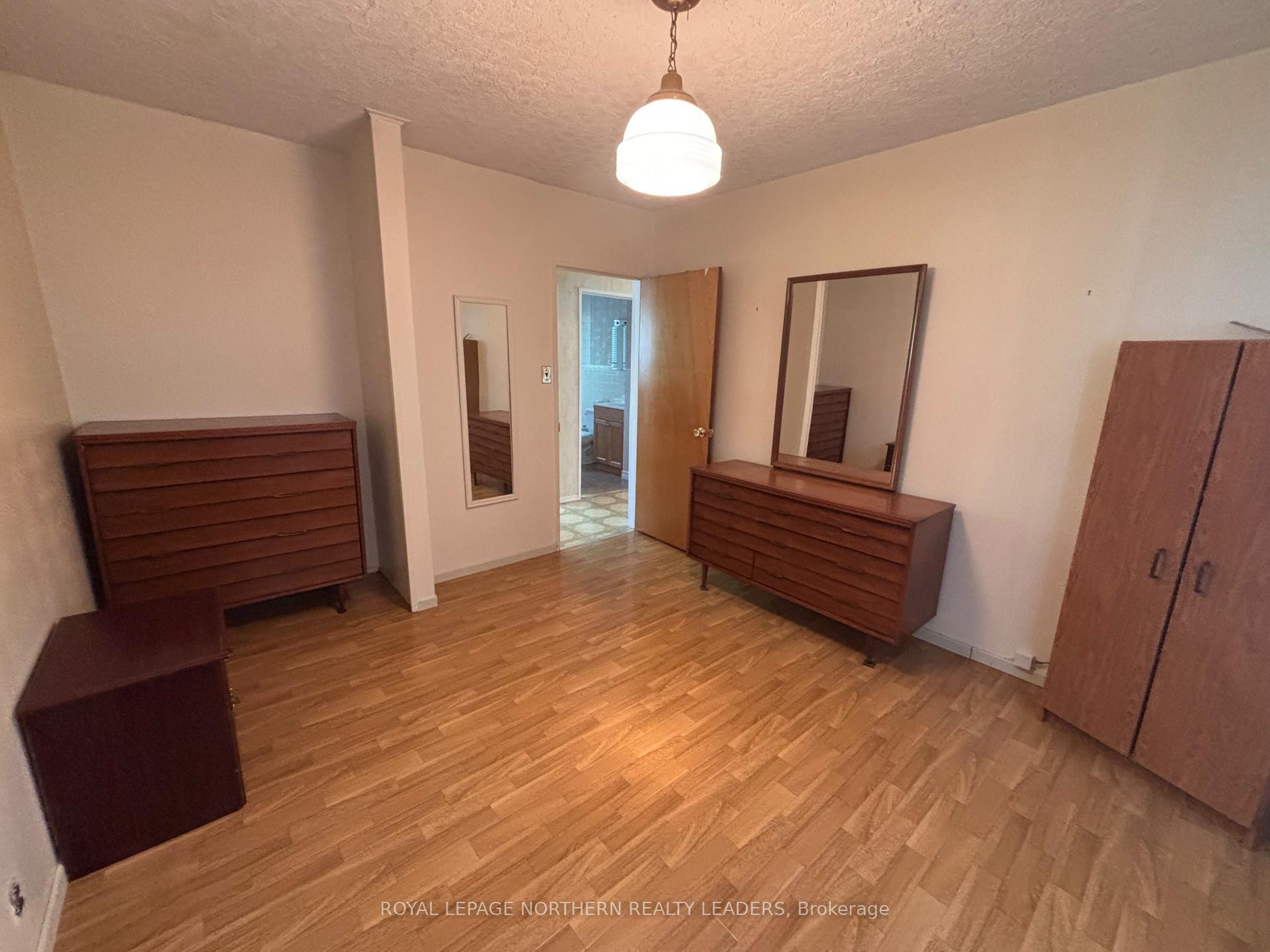 Photo 21 of 208 Second Avenue N, Cochrane — HOMEH