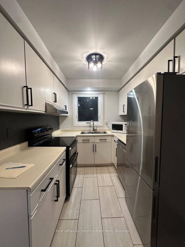 Photo 7 of Unit 1, 26 Hartsfield Drive, Clarington, Courtice — HOMEH