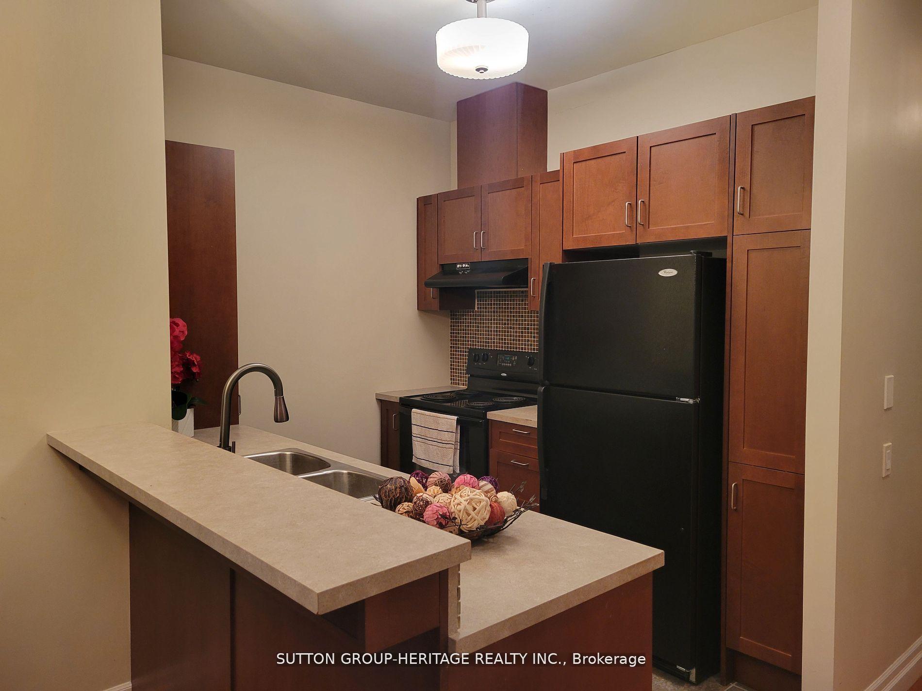 Photo 10 of Unit 402, 44 Bond Street W, Oshawa, O'Neill — HOMEH