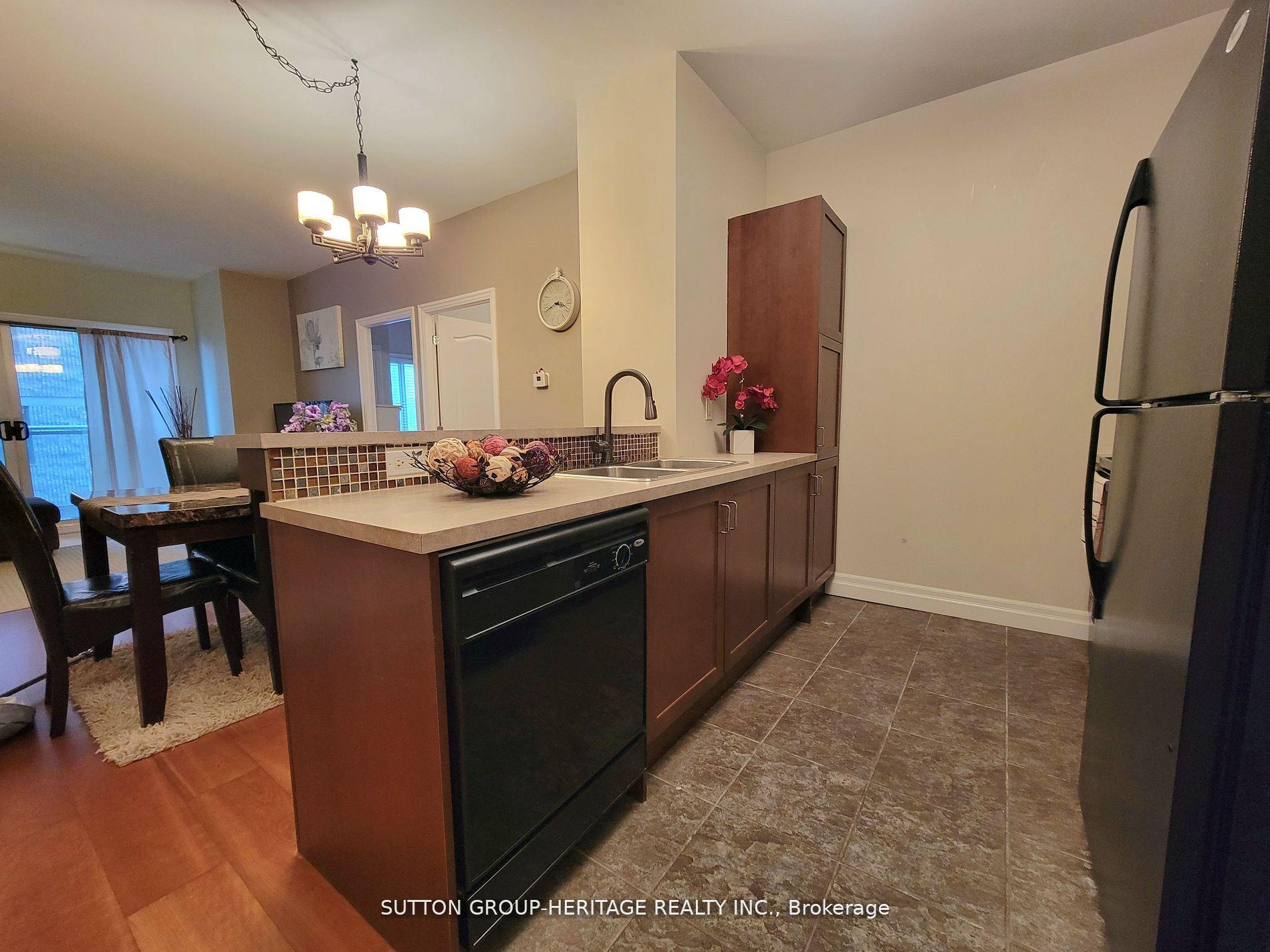 Photo 11 of Unit 402, 44 Bond Street W, Oshawa, O'Neill — HOMEH