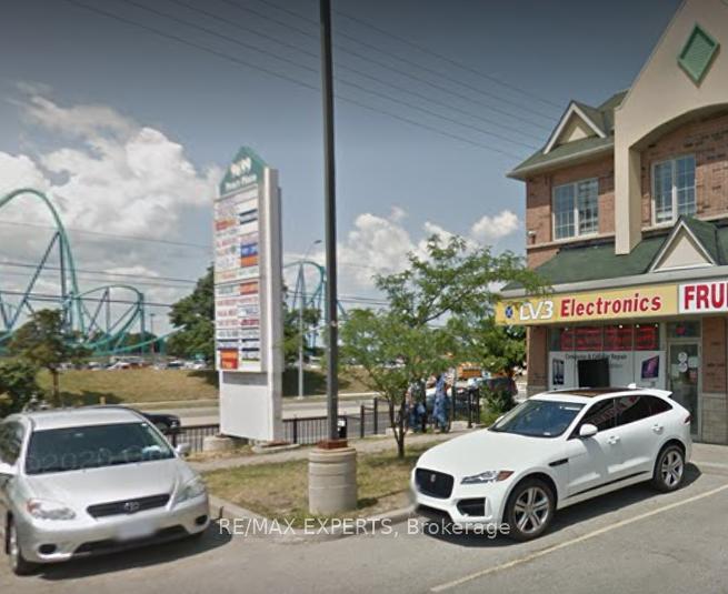 Photo 1 of Unit 8, 9699 Jane Street, Vaughan, Maple — HOMEH