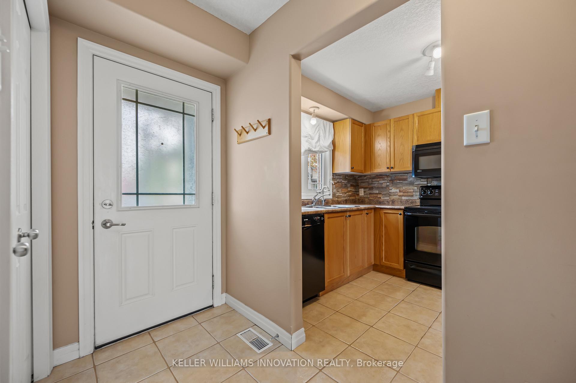 Photo 4 of Unit 50, 535 Windflower Crescent, Kitchener, Larentian West — HOMEH