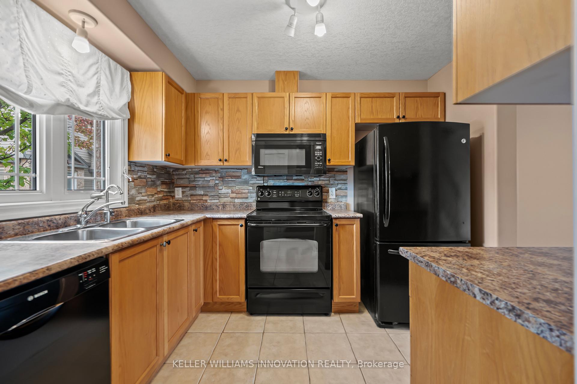 Photo 6 of Unit 50, 535 Windflower Crescent, Kitchener, Larentian West — HOMEH