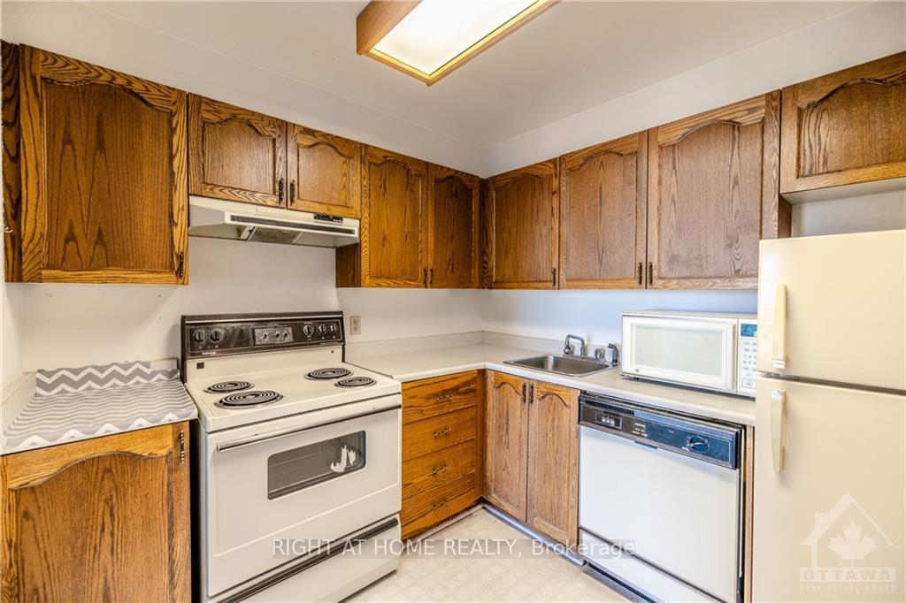 Photo 4 of Unit 1112, 1440 Heron Road, Ottawa, Heron Gate — HOMEH