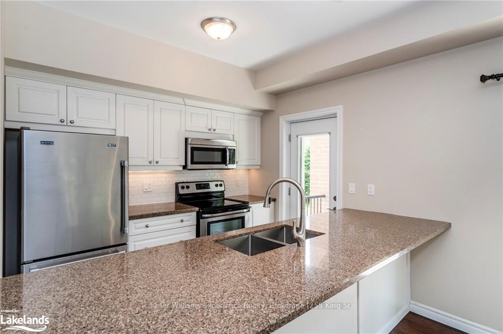 Photo 11 of Unit 105, 19A Yonge Street N, Springwater, Elmvale — HOMEH