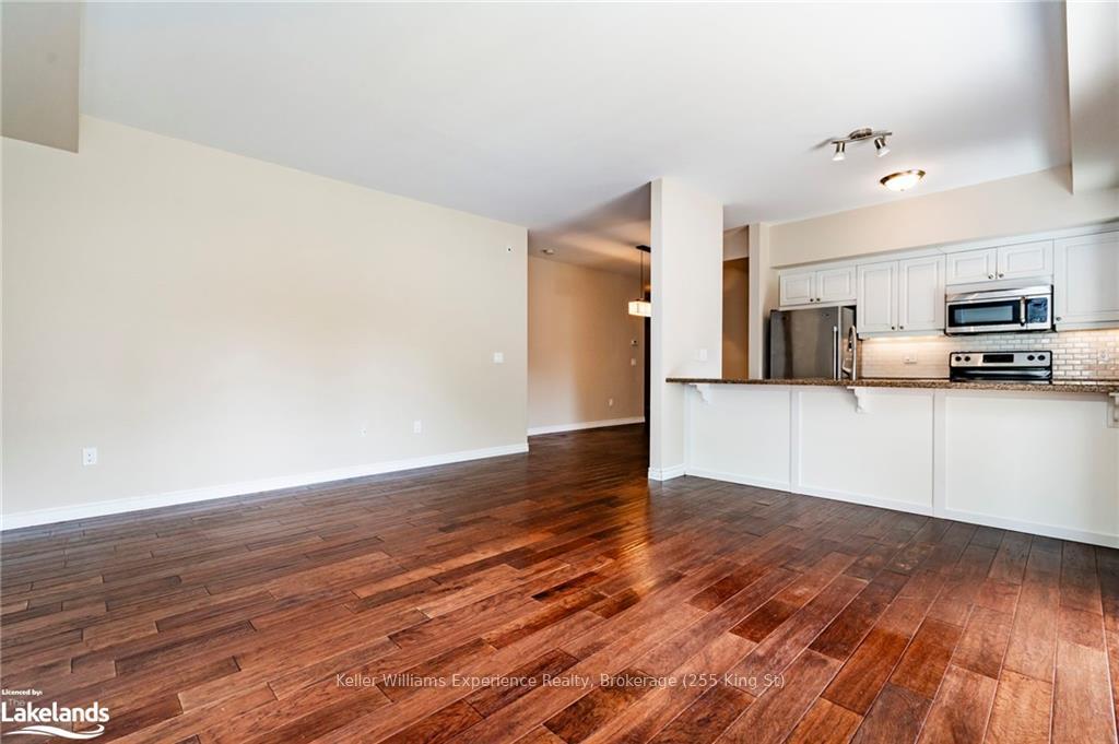 Photo 12 of Unit 105, 19A Yonge Street N, Springwater, Elmvale — HOMEH