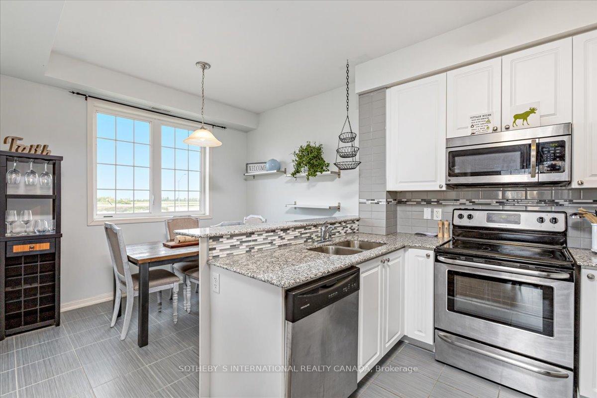 Photo 6 of Unit 306, 52 Harvey Johnston Way, Whitby, Brooklin — HOMEH