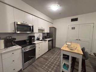 Photo 13 of Unit 437, 110 Fergus Avenue, Kitchener — HOMEH