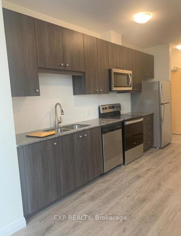 Photo 4 of Unit 1304, 104 Garment Street, Kitchener — HOMEH