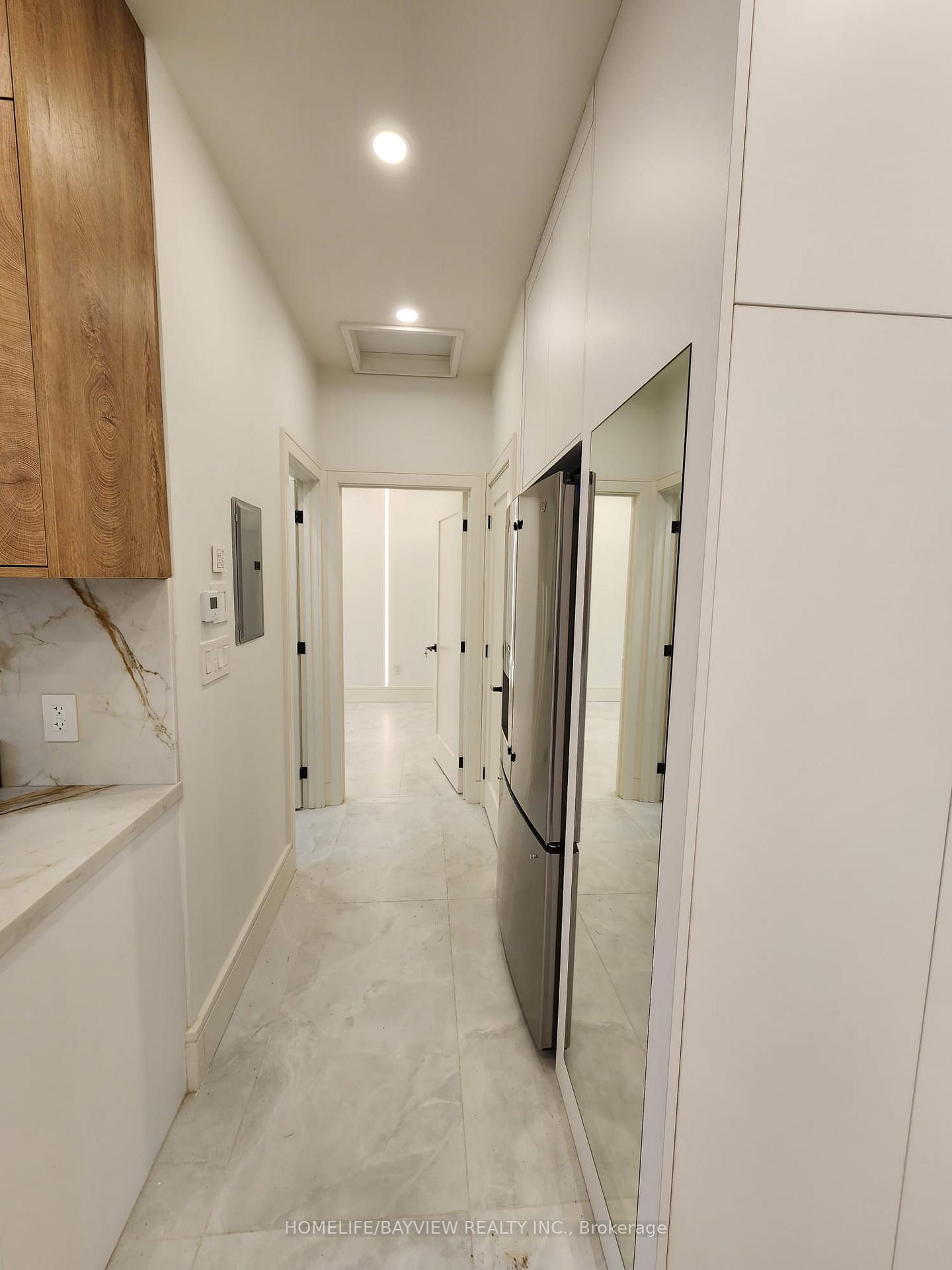 Photo 5 of Unit C, 57 Fairway Drive, Aurora, Aurora Highlands — HOMEH