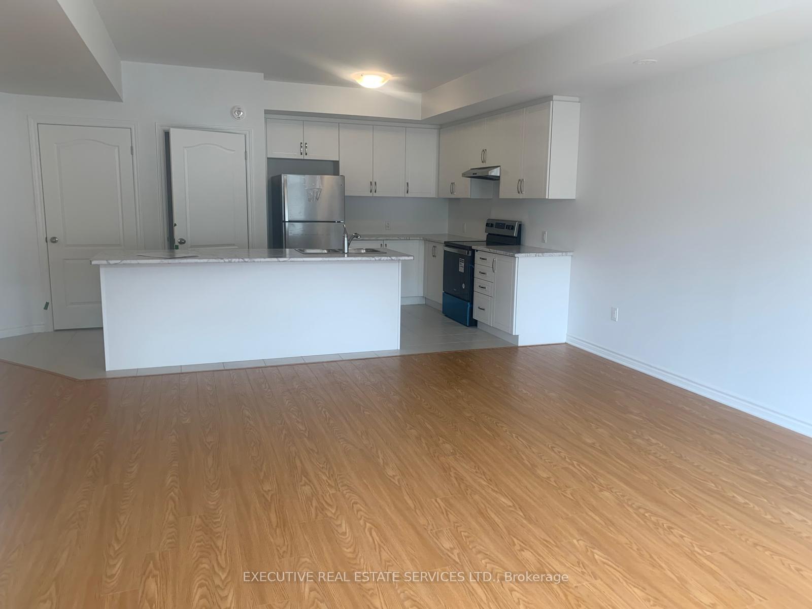 Photo 2 of Unit # 302, 439 Dougall Avenue, Caledon, Rural Caledon — HOMEH