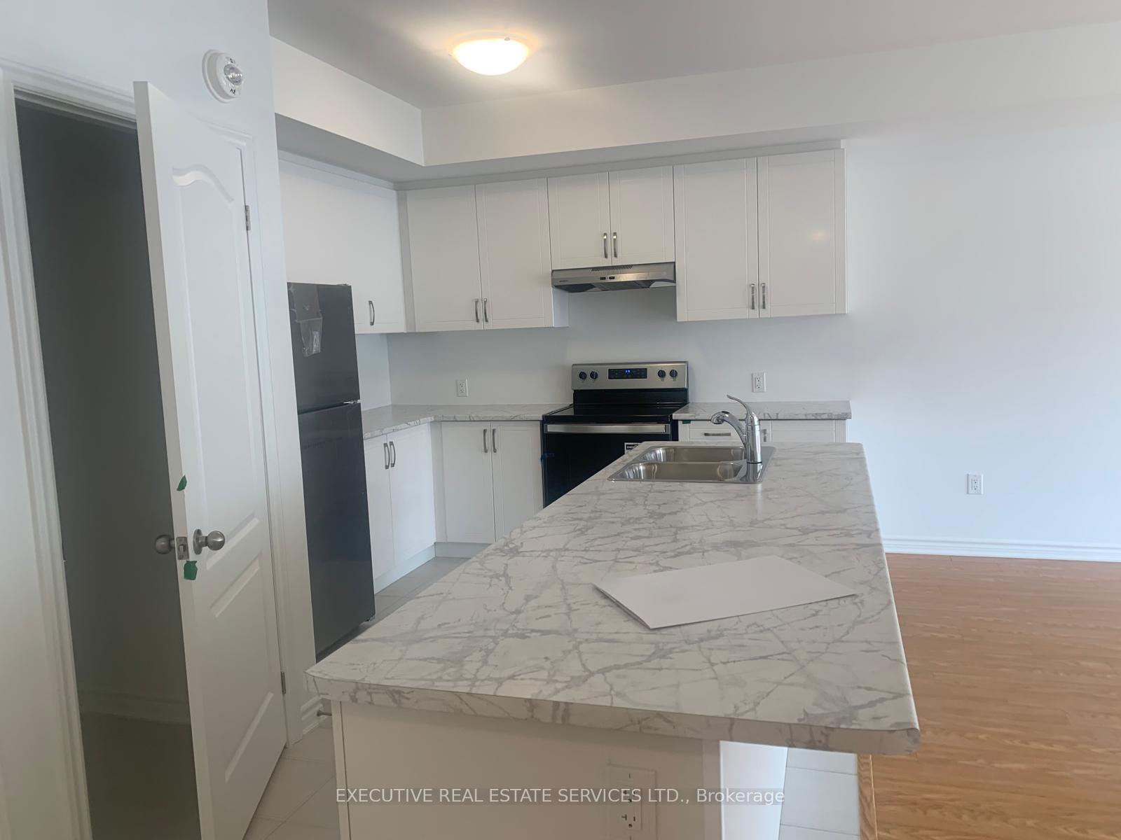 Photo 3 of Unit # 302, 439 Dougall Avenue, Caledon, Rural Caledon — HOMEH