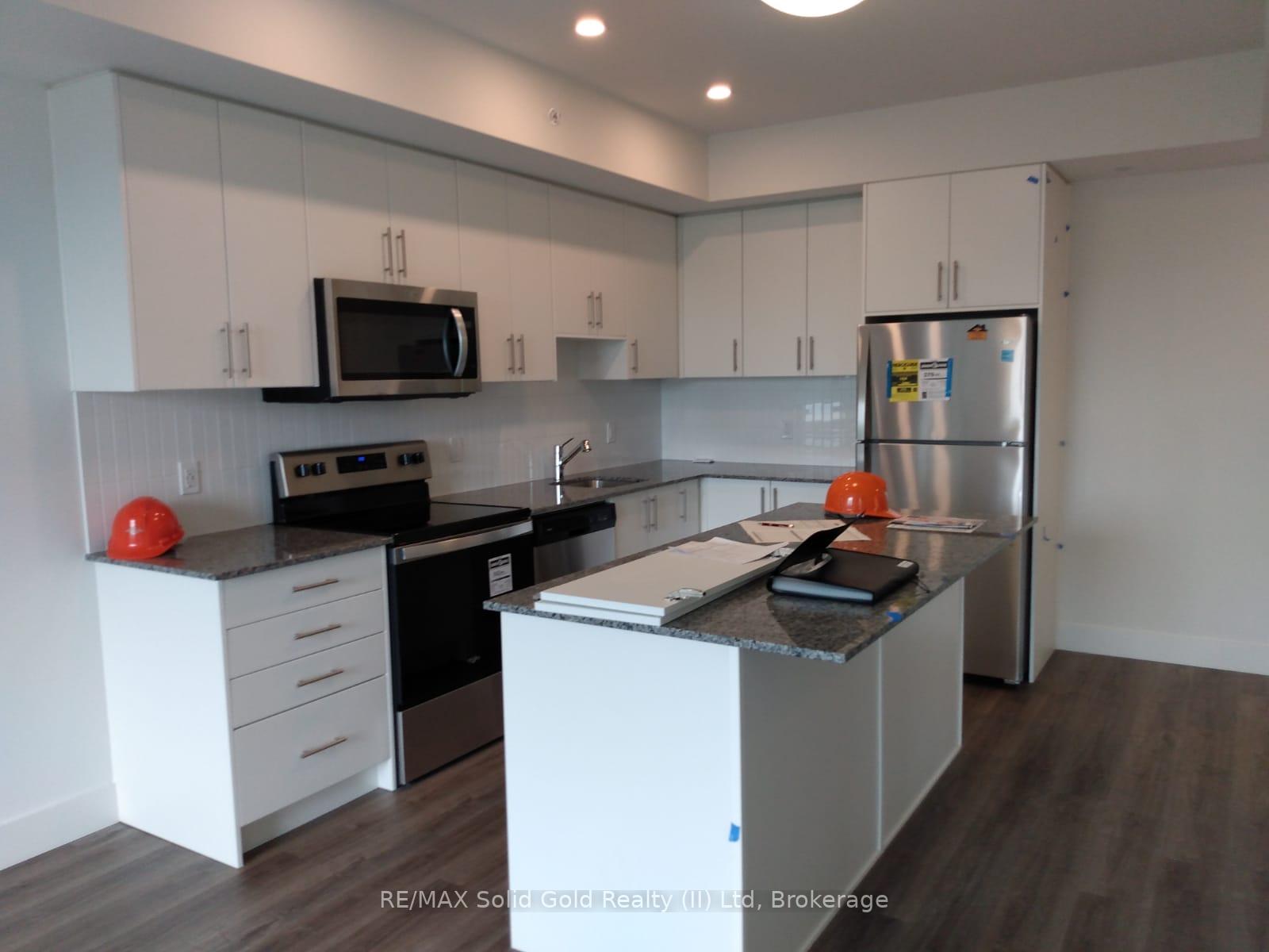 Photo 5 of Unit 406, 103 Roger Street, Waterloo — HOMEH