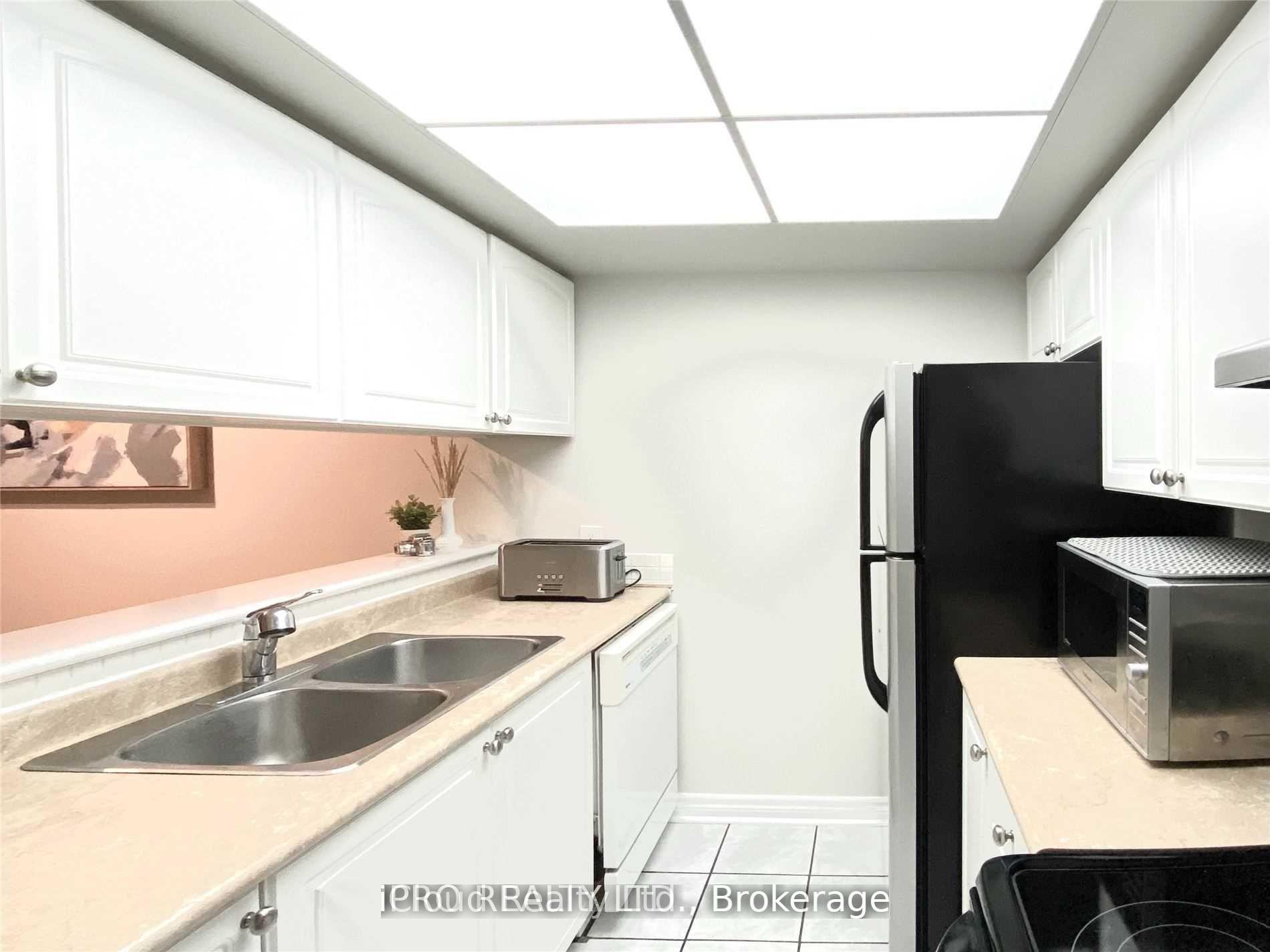 Photo 11 of Unit 201, 75 Ellen Street, Barrie, Allandale Centre — HOMEH