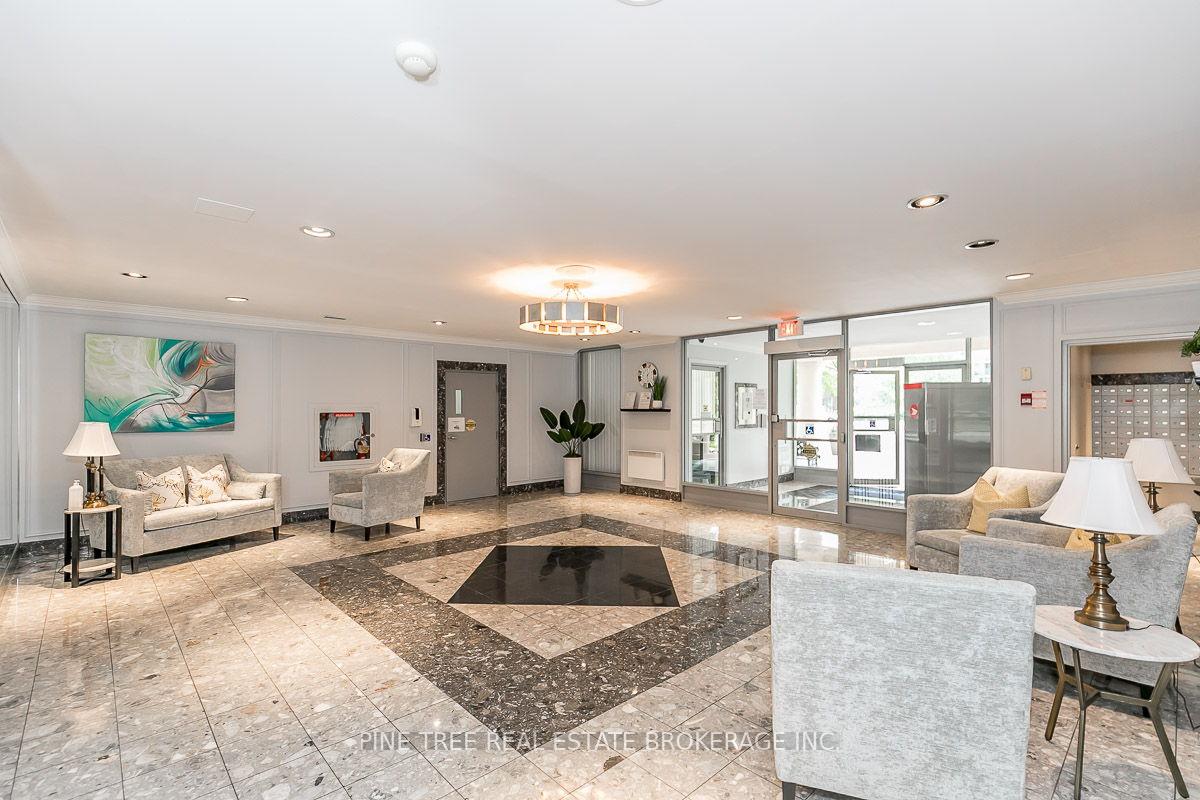 Photo 6 of Unit 201, 65 Ellen Street, Barrie, Lakeshore — HOMEH