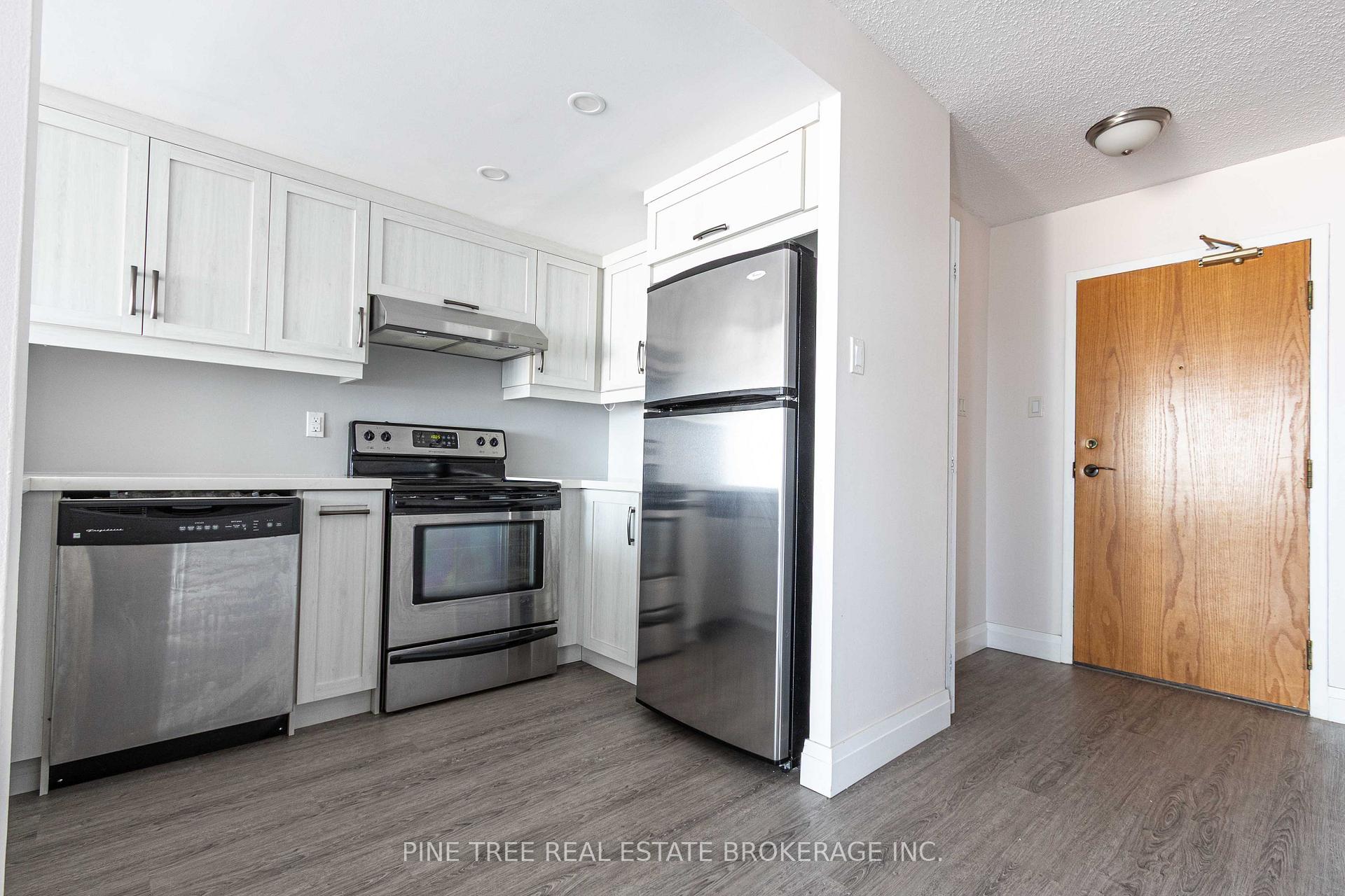 Photo 11 of Unit 201, 65 Ellen Street, Barrie, Lakeshore — HOMEH