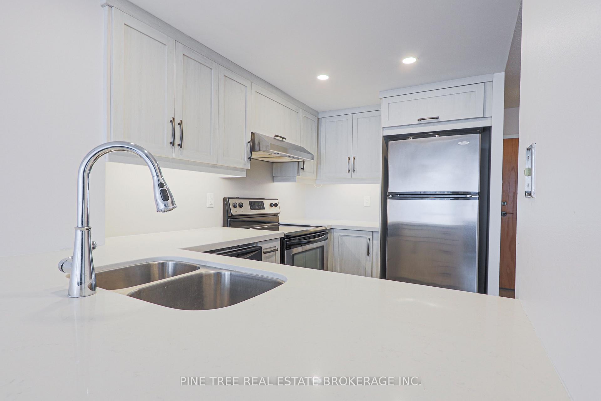 Photo 13 of Unit 201, 65 Ellen Street, Barrie, Lakeshore — HOMEH