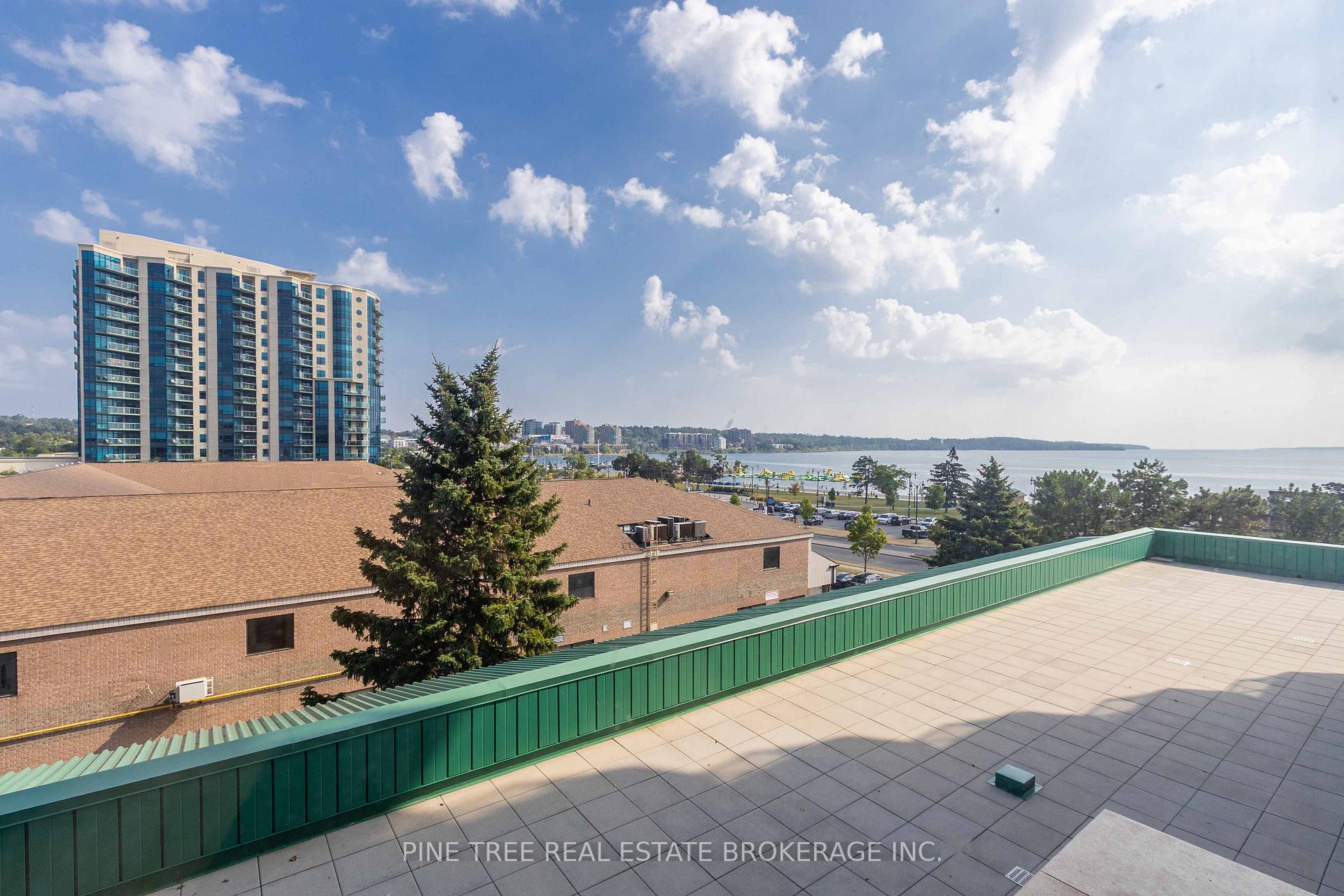 Photo 25 of Unit 201, 65 Ellen Street, Barrie, Lakeshore — HOMEH