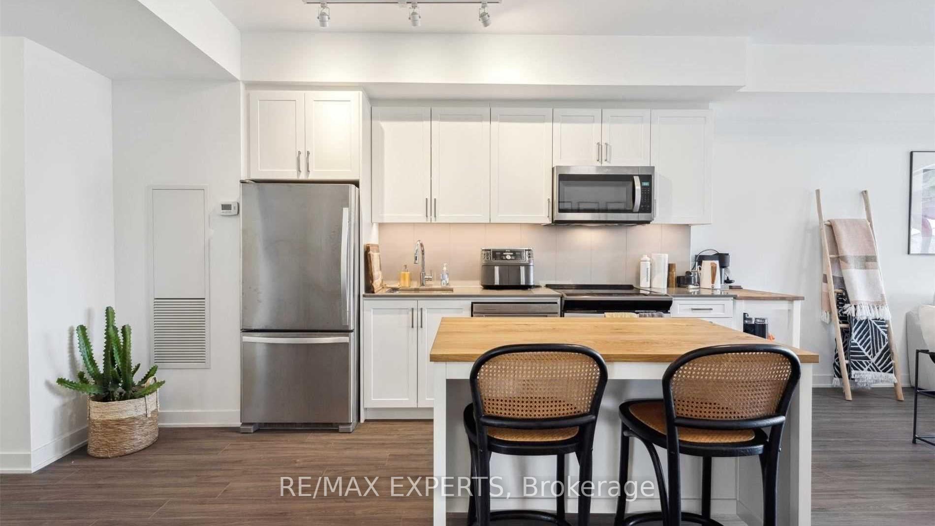 Photo 10 of Unit 204, 681 Yonge Street, Barrie, Painswick South — HOMEH