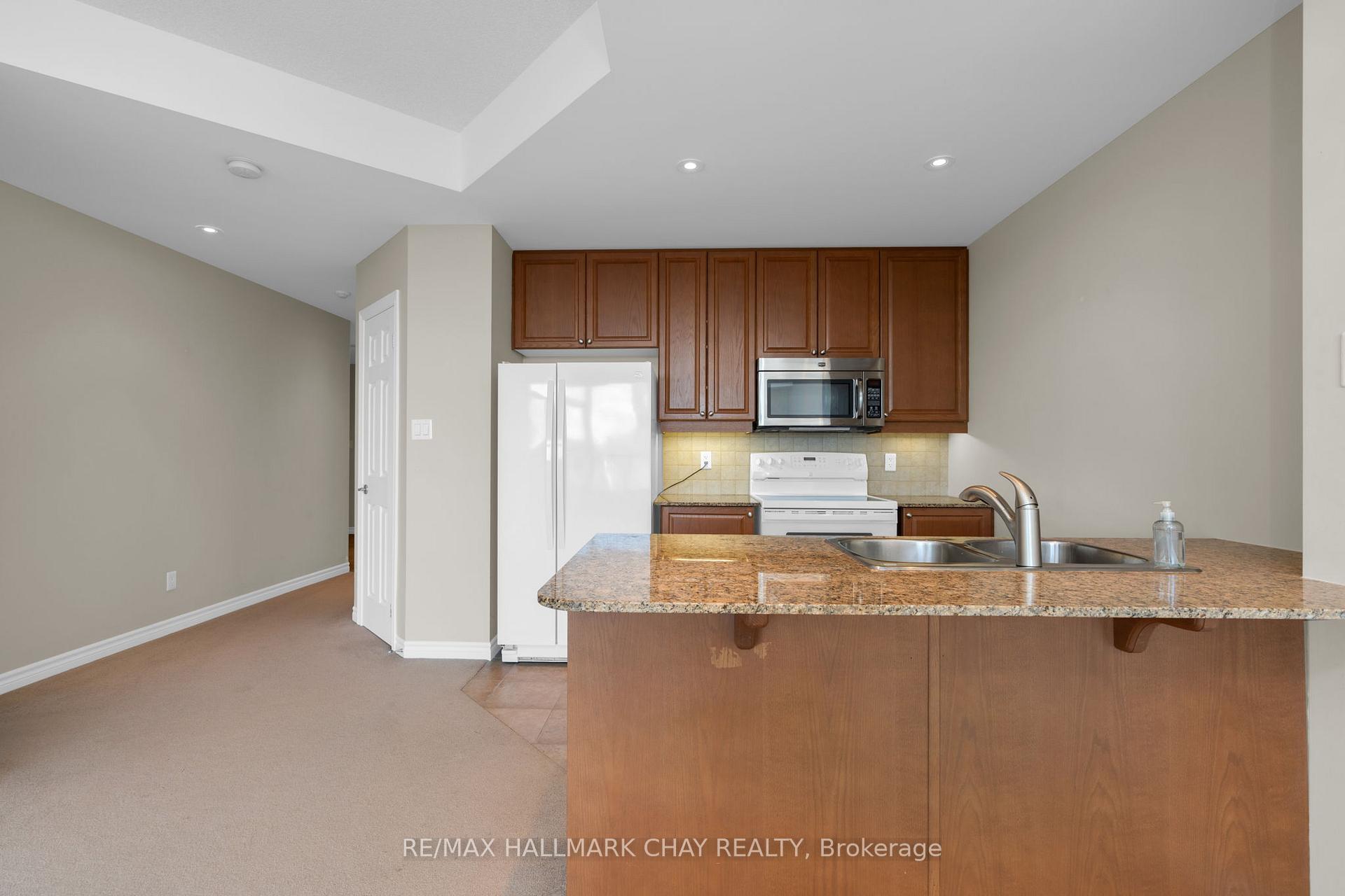 Photo 5 of Unit 1401, 33 Ellen Street, Barrie, City Centre — HOMEH