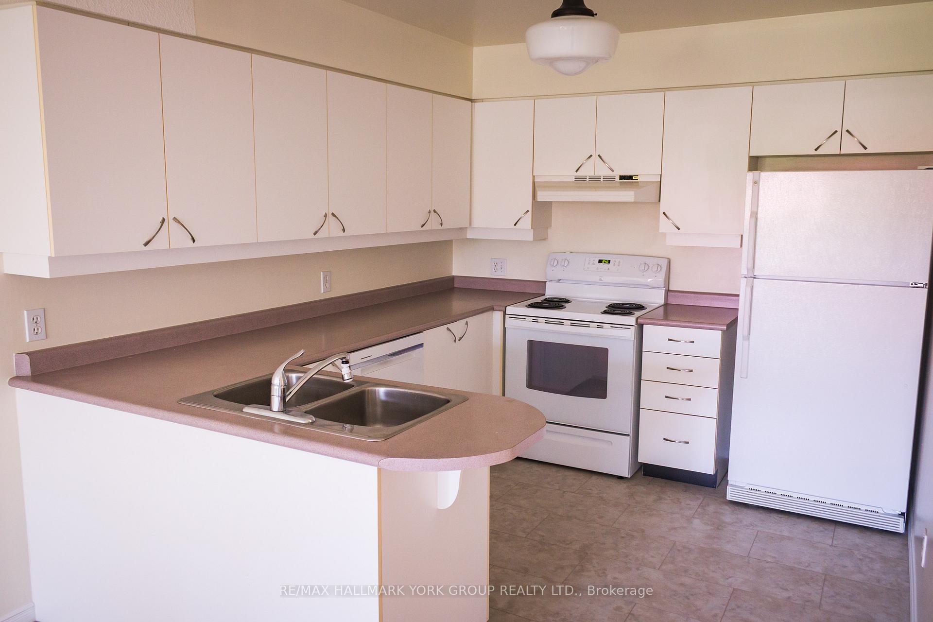 Photo 3 of Unit 408, 143 Edgehill Drive, Barrie, Letitia Heights — HOMEH