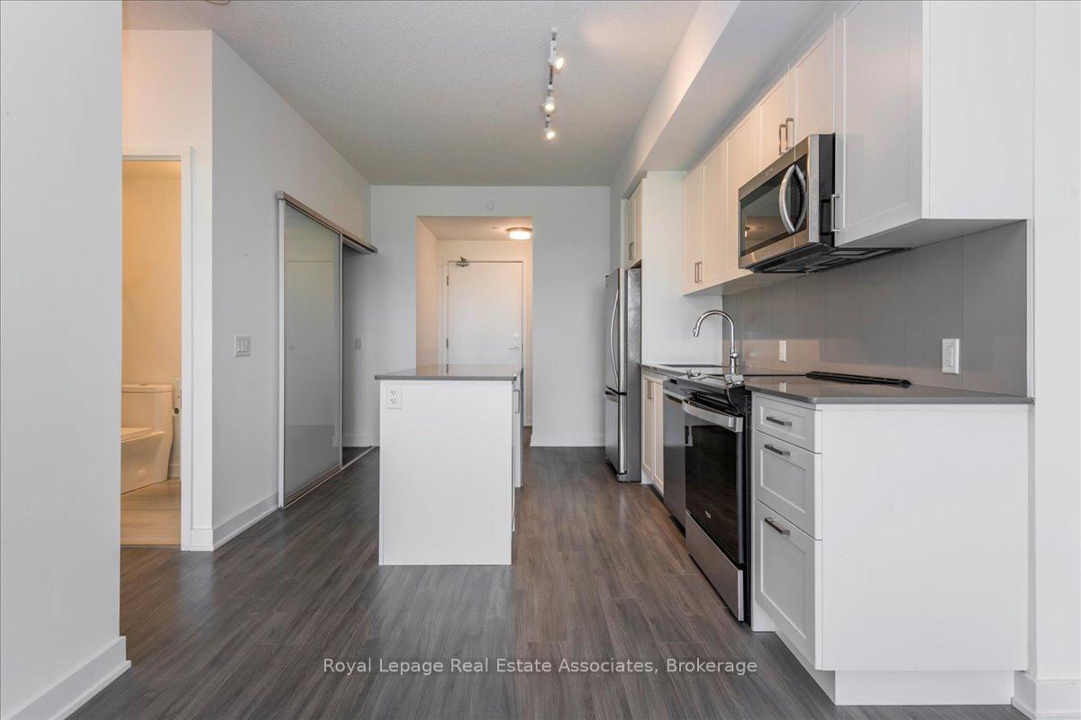 Photo 4 of Unit 319, 681 Yonge Street, Barrie, Painswick South — HOMEH