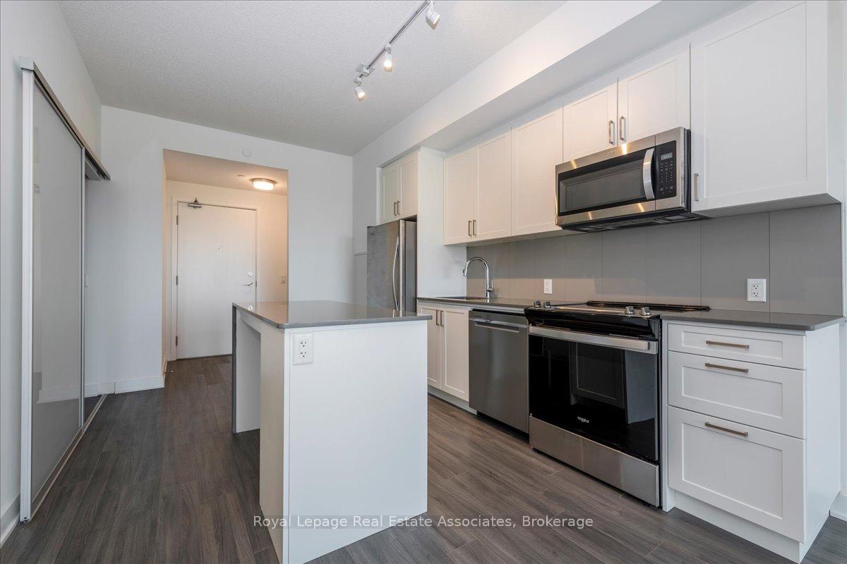 Photo 5 of Unit 319, 681 Yonge Street, Barrie, Painswick South — HOMEH