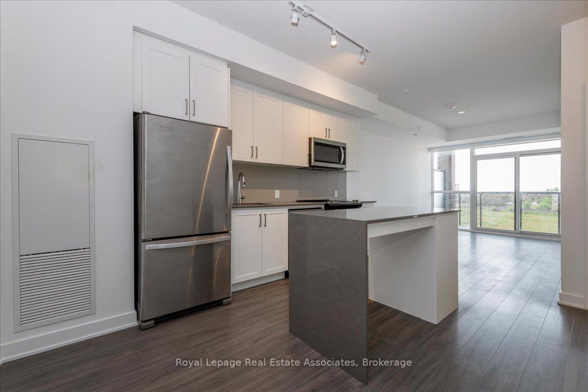 Photo 6 of Unit 319, 681 Yonge Street, Barrie, Painswick South — HOMEH