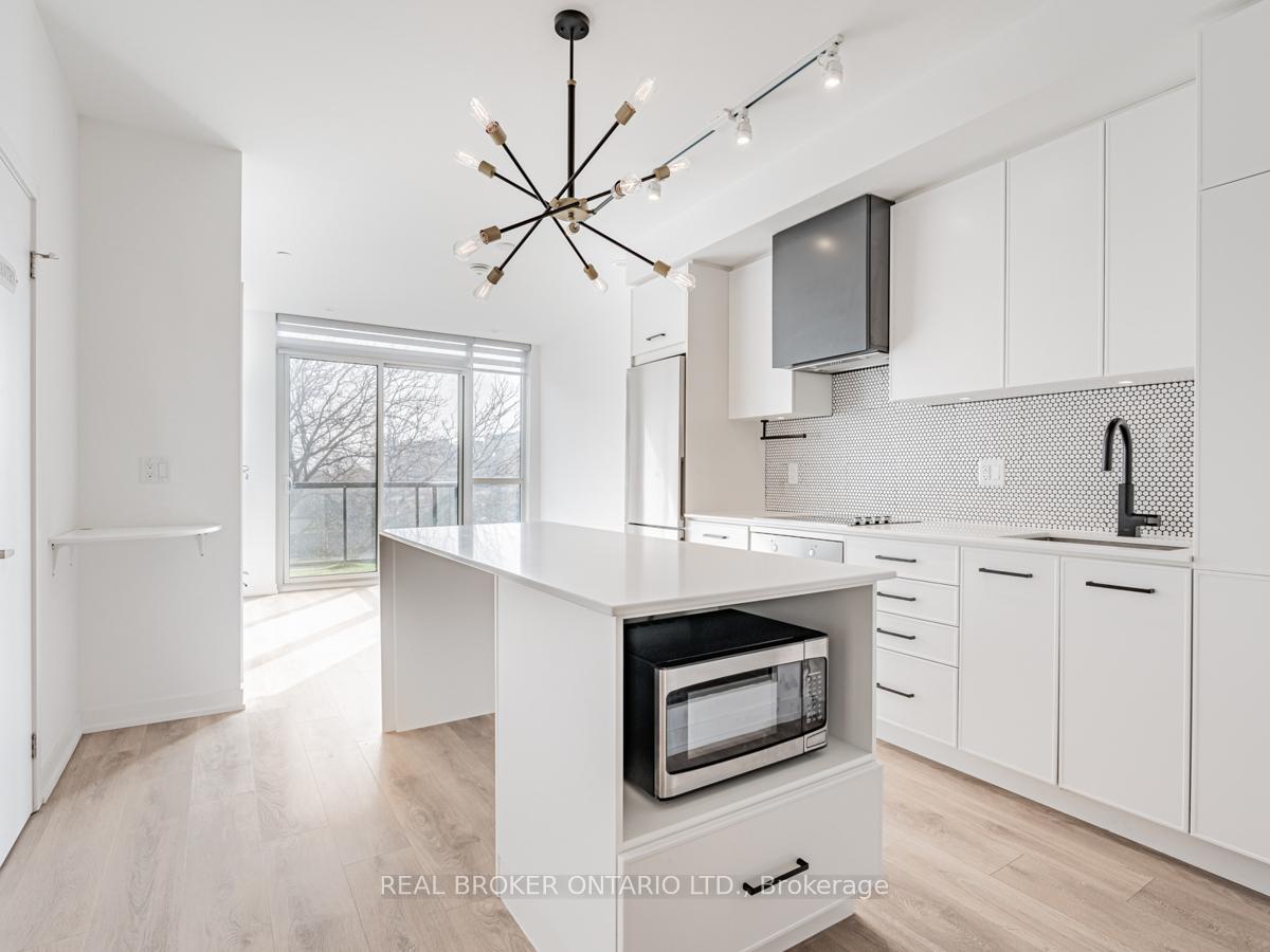 Photo 4 of Unit 414, 899 Queen Street E, Toronto, South Riverdale — HOMEH